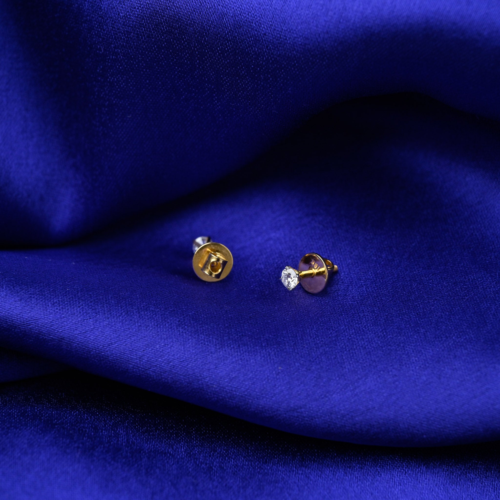 25 Cents Each Solitaire Diamond Studs