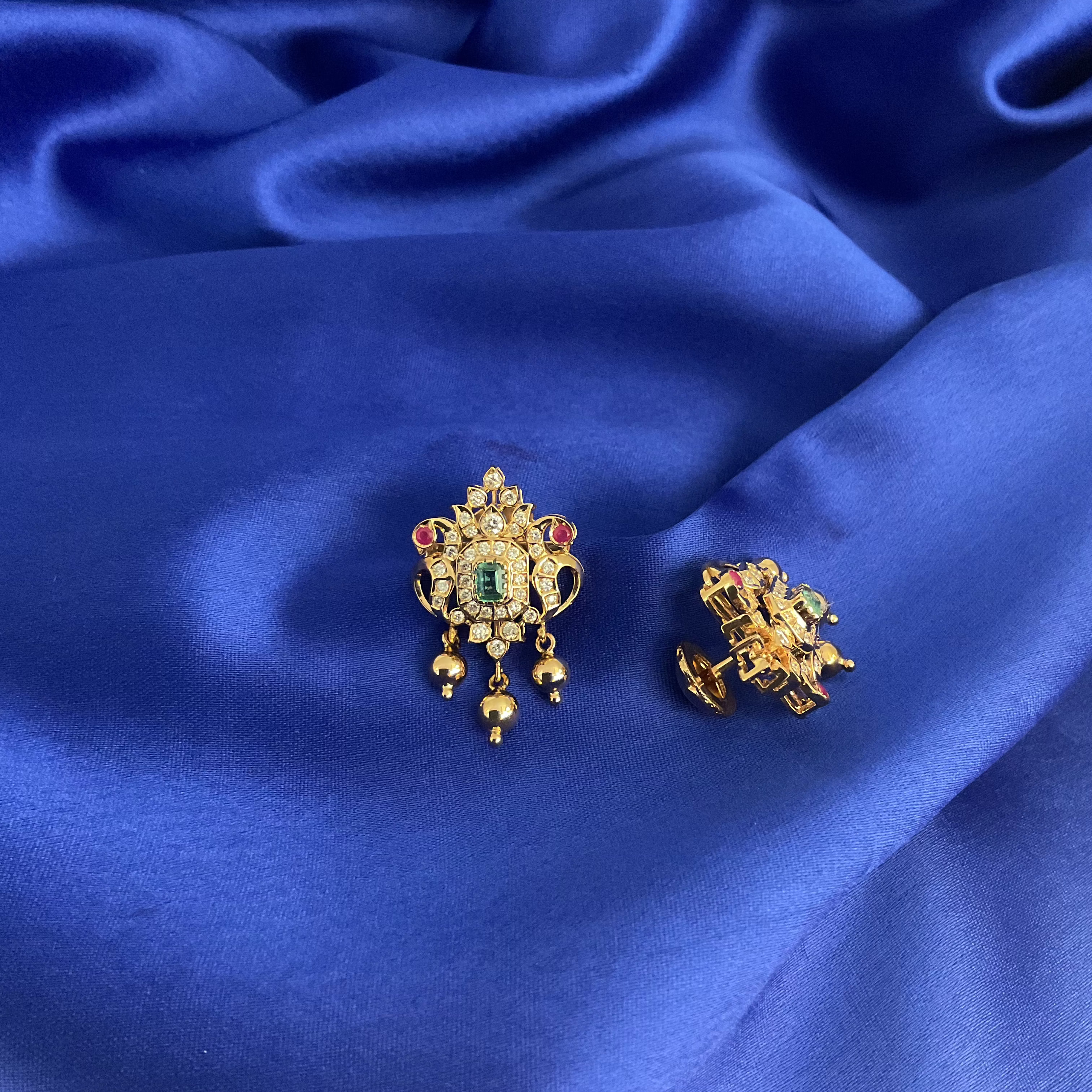 Twin Peacock Studs