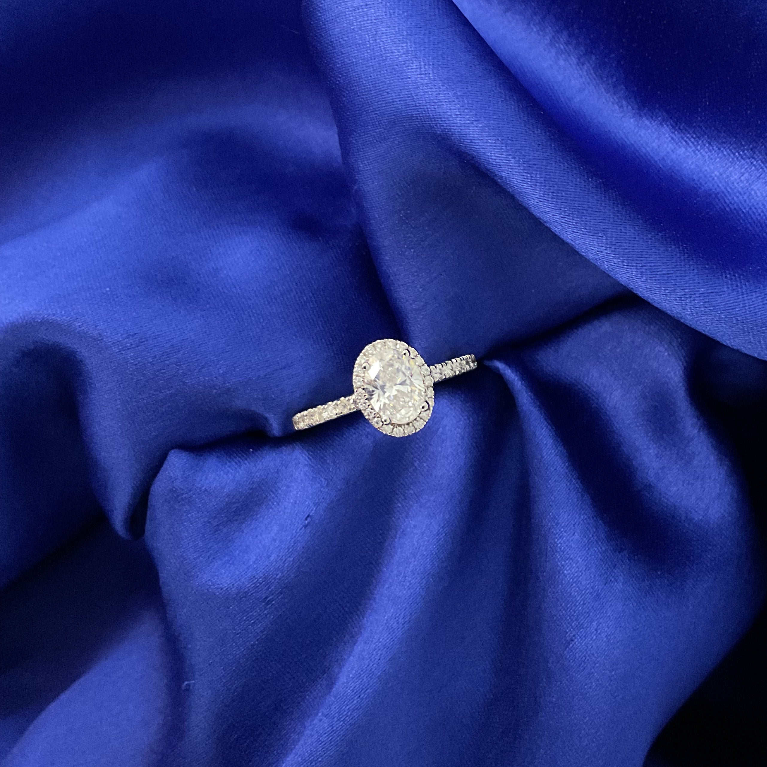 Oval Opulence Solitaire Ring: Size 12.5