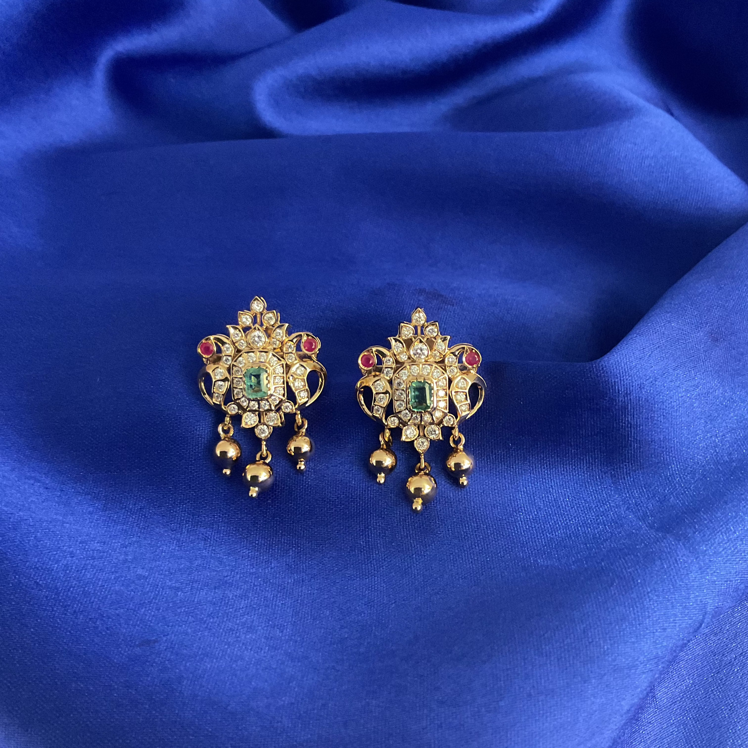Twin Peacock Studs