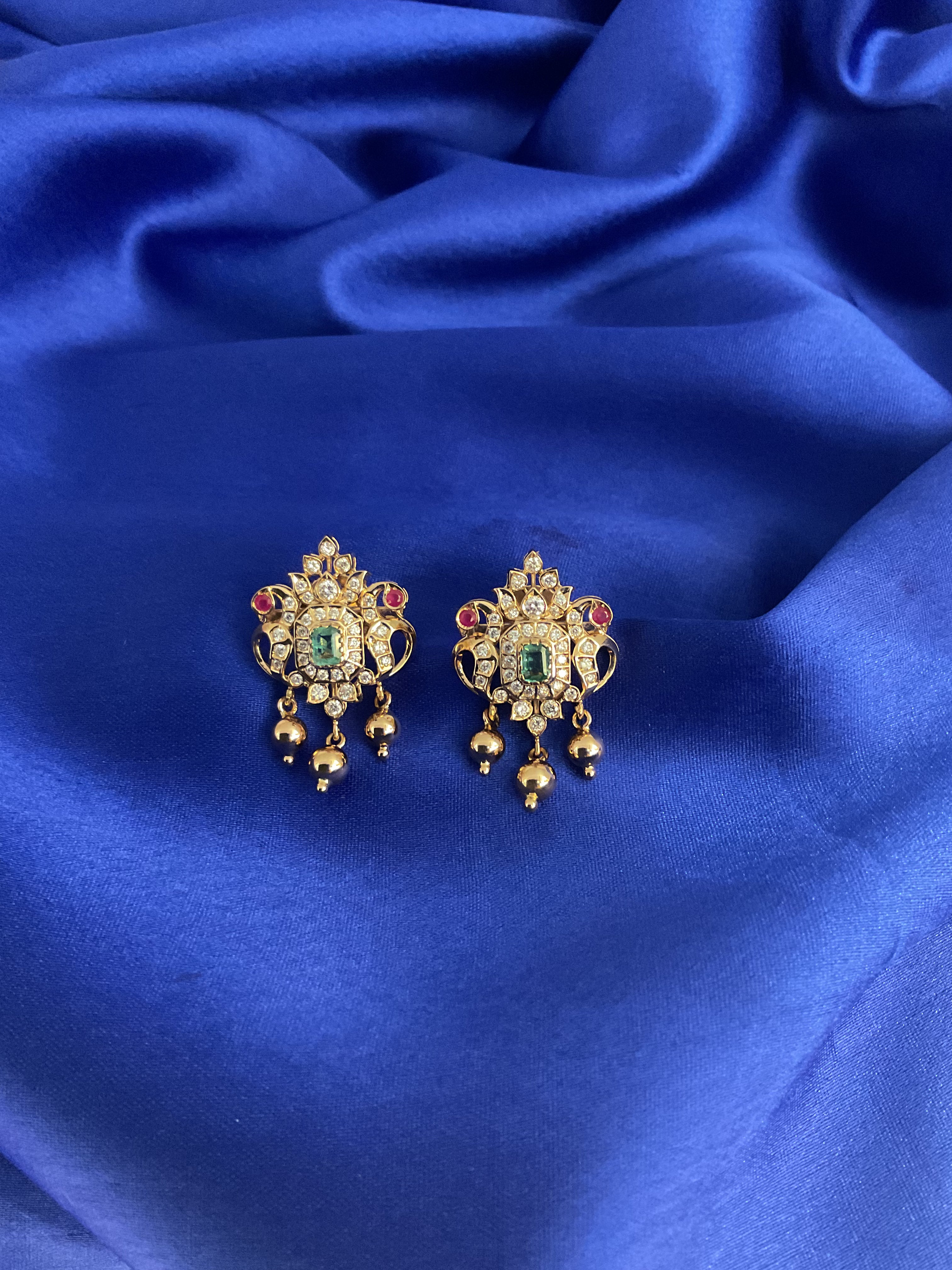 Twin Peacock Studs